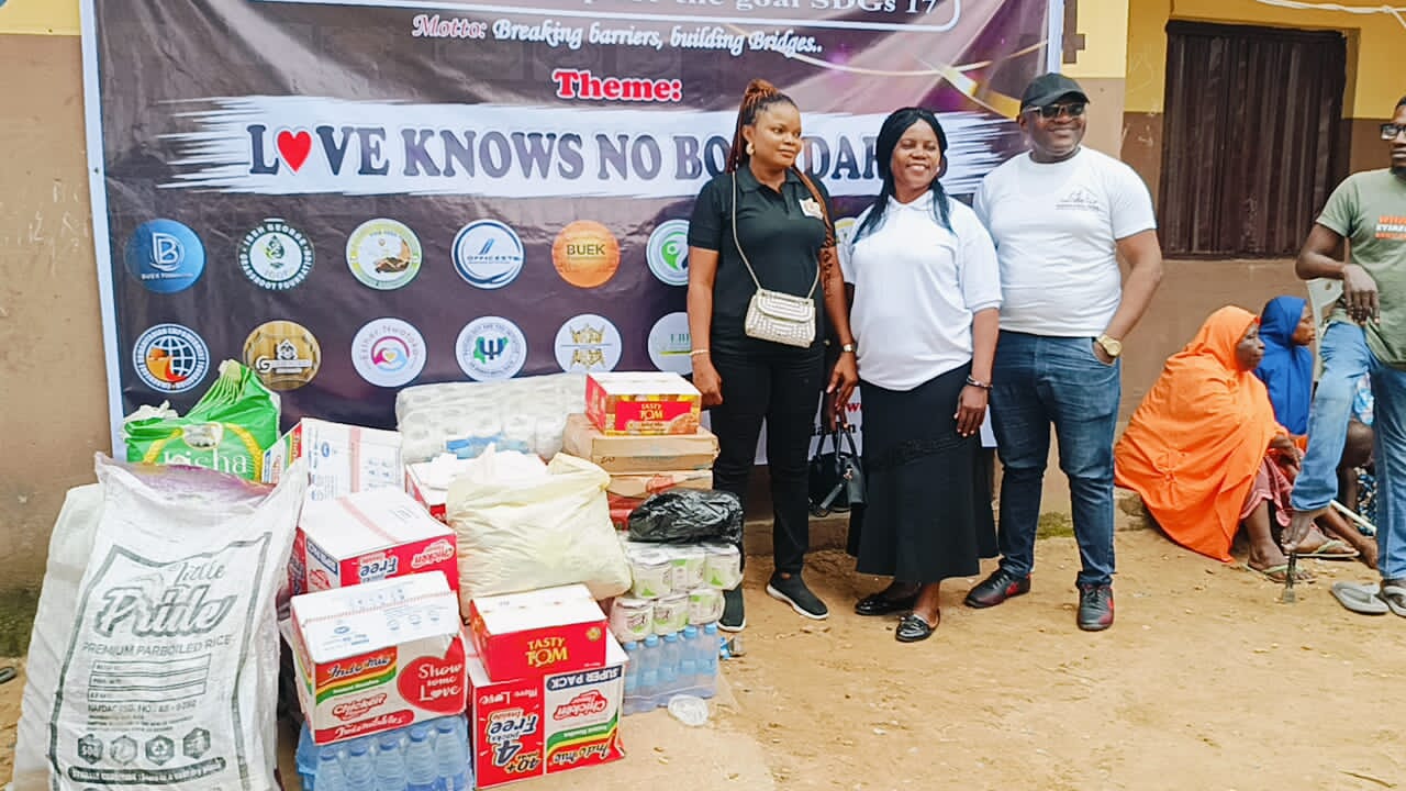 Food empowerment outreach distributing food items to a family